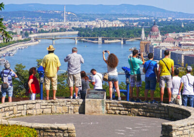 Tourists taking pictures of sights part of Budapest walking tours